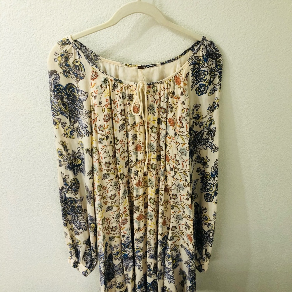 Free People Boho cream based floral long sleeve top.